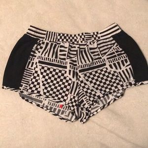 shorts with tribal patten and black on the sides